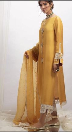 Buy Indian Designer Silk Mustard Yellow Kurta Pant Mustard Kurta online on Etsy India. Shop for handmade, vintage and unique Womens Dresses items from Classicwearboutique online on Etsy Yellow Silk Palazzo Set For Wedding, Wedding Sharara With Gota Work And Long Sleeves, Elegant Yellow Palazzo Set With Traditional Drape, Elegant Salwar Kameez With Gota Work For Transitional Season, Elegant Yellow Palazzo Set For Eid, Elegant Yellow Silk Sharara, Traditional Long Sleeve Wear With Gota Work For Wedding, Wedding Yellow Palazzo Set With Straight Kurta, Wedding Palazzo Set With Gota Work In Art Silk