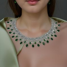 "Real looking AAA cubic zirconia and emerald diamond necklace with an adjustable length, comes with earrings.  Dimension: 5.5\" end to end length, Earrings: 2\" long" Party Bridal Necklace With 17 Jewels And Crystal, Silver Emerald Necklace For Party, Party Crystal Emerald Necklace Hand Set, Hand Set Emerald Necklace With Cubic Zirconia For Party, Hand Set Cubic Zirconia Emerald Necklace For Party, Hand Set Crystal Necklace For Party, Party Emerald Necklace With Jewels, Hand Set Cubic Zirconia Diamond Necklace For Parties, Party Cubic Zirconia Diamond Necklace Hand Set