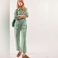 Introducing The Free People We The Free Geronimo Jumpsuit Coverall In Cascada Green, Size Small. This One-Piece Jumpsuit Coverall Features A Button-Up Collar And Front Button Closures With Cuffs, A Classic Collar, And Oversized Workwear Pockets. The Relaxed Fit And Straight Leg Style Make It Perfect For Any Occasion, From Casual To Party/Cocktail, Workwear, Or Even Travel. Made From 100% Cotton Denim With A Rigid Seam Pattern, This Jumpsuit Coverall Is Machine Washable And Easy To Care For. It H Spring Overalls Jumpsuits And Rompers With Pockets, Spring Utility Jumpsuits And Rompers With Pockets, Utility Denim Jumpsuit With Pockets For Work, Utility Overalls With Patch Pockets For Spring, Summer Overalls With Patch Pockets, Spring Overalls With Patch Pockets, Overall Jumpsuits And Rompers With Patch Pockets For Spring, Utility Cotton Jumpsuits And Rompers With Patch Pockets, Spring Utility Overalls