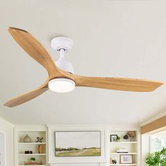 a white ceiling fan in a living room