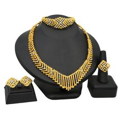 Indian Gold Plated Jewelry Sets Wedding Dubai Choker Necklace Bracelet Earring Ring Nigerian Bridal Set African JeweleryModel Number:1005003058985413 (1) Necklace approx :43cm +5cm. Bracelet approx :19.2cm .One set includes 1 Necklace,1 Bracelet,a pair of Stud Earrings and a Ring. (2) When you go to a banquet, necklace suit will match your dress very well, highlighting your temperament; when you go to a dance party, it will make you look more mature. (3) The jewelry set is packed with a box.Ideal gift to Lover,Girlfriend,Wife,Mother,Daughter,Fiancee;And perfect for Wedding, Prom, Mother of the Bride, Pageants, Homecoming,Engagement Parties, Birthdays and Other Special Occasions. (4) Gold plated Zinc metal alloy , Nickel & Lead Free, Harmless and hypoallergenic for skin. Wedding Jewelry With Metal Plating, Plated Alloy Wedding Jewelry, Elegant Metal Jewelry For Anniversary, Wedding Alloy Plated Jewelry, Anniversary Costume Jewelry Plated, Anniversary Costume Jewelry, Plated, Plated Alloy Jewelry Sets For Wedding, Wedding Jewelry Sets With Plating, Wedding Alloy Plated Jewelry Sets