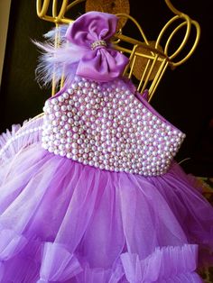 Our lilac pearl long tail princess dress will be a great choice for your daughter on special occasions such as weddings, birthdays, summer parties. It is prepared from 3 to 12 years old. It is special for you in line with the color and changes you want. After you make an order, please specify the waist, chest, waist, bust to knee size. This beautiful princess will be sent a special crown as a gift. Lavender Ball Gown For Party, Elegant Purple Sleeveless Tutu Dress, Elegant Sleeveless Purple Tutu Dress, Lavender Tulle Party Gown, Lavender Tulle Gown For Party, Princess Style Lavender Party Gown, Princess Lavender Gown For Party, Princess Style Lavender Gown For Party, Princess Style Purple Ball Gown