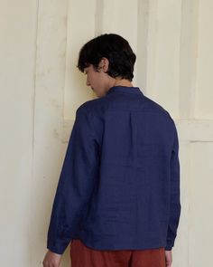 Our collared, long sleeved linen blouse with an henley neckline and delicate buttoning cuffs is a classic, heirloom style shirt crafted in a light weight, zesty rich blue color linen. Perfectly styled under a knitted sweater for that elevated British aesthetic. Garment dyed to a rich blue shade, in a local dye house that proudly uses low impact processing and GOTS certified dyes. DETAILS Blouse Features:- A collared, buttoning henley neckline- Full length sleeves with a button cuff- Slight A-lin Long Sleeve Linen Shirt With Placket, Blue Linen Shirt For Fall, Classic Long Sleeve Flax Tops, Linen Long Sleeve Shirt With Button Closure, Flax Long Sleeve Shirt With Button Closure, Long Sleeve Flax Shirt With Button Closure, Linen Long Sleeve Top With Button Closure, Long Sleeve Linen Top With Button Closure, Long Sleeve Linen Blouse With Button Closure