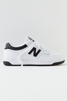 Retro-inspired and ultra-cool, these heritage sneakers from New Balance feature a low-profile design taking cues from classic basketball styles with a super cushioned interior and leather paneled uppers. **Features:** Low-top style, paneled leather fabrication, perforated toe box, padded tongue and collar, Ortholite cushioning, " N" logo graphic, two-tone rubber outsole, lace-up closure **Why We | 480 Court Sneakers by New Balance at Free People in Black, Size: US 6.5 M Classic Lace-up Basketball Shoes With Contrast Sole, Classic Basketball Shoes With Cushioned Footbed For Streetwear, Classic Basketball Shoes With Gum Sole For Streetwear, Classic Streetwear Basketball Shoes With Round Toe, Throwback Sneakers With Gum Sole For Sports, Sporty Lace-up Basketball Shoes For Streetwear, Low-top Basketball Shoes With Gum Sole For Streetwear, Classic Sports Sneakers With Gum Sole, Classic Running Shoes With Contrast Sole For Streetwear