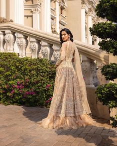 Peach Bridal Dress Pakistani in Gown Lehenga Style is a breathtaking attire that is hand-crafted with embellishments and luxury designs. Sequins, pearls, and crystals enhance the glamour of the beautiful Pakistani Bridal Gown, making it an epitome of beauty. Pakistani Bridal Gown The Pakistani Bridal Gown comes in an alluring peach color and is gracefully emblazoned with hand-crafted details of embroidery, tilla, and silverwork. Hand-crafted details of pearls, sequins, crystals, and motifs make Elegant Hand Embellished Semi-stitched Gown, Hand Embellished Maxi Wedding Gown, Hand Embellished Floor-length Gown For Reception, Bollywood Style Hand Embellished Saree Gown, Designer Wear Hand Embellished Maxi Gown, Designer Hand Embellished Maxi Gown, Hand Embellished Maxi Gown For Designer Wear, Hand Embellished Floor-length Raw Silk Lehenga, Designer Hand-embellished Maxi Gown