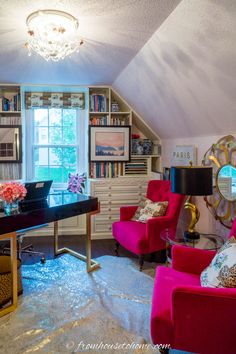 a living room filled with furniture and a chandelier