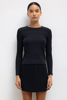 #color_black Sleek Long Sleeve Top With Thumbholes, Classic Tops With Minimal Stretch For Winter, Classic Winter Tops With Minimal Stretch, Sleek Fitted Long Sleeve Top For Fall, Sleek Long Sleeve Tops For Fall, Classic Stretch Tops With Ribbed Cuffs, Classic Long Sleeve Tops With Minimal Stretch, Fitted Cotton Long Sleeve Top For Fall, Sleek Fitted Long Sleeve Top