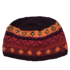 a knitted hat is shown on a white background, with an orange and purple pattern