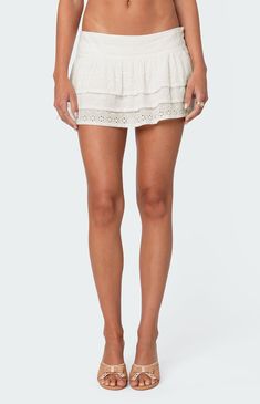 Online only!The Fluer Ruffled Eyelet Mini Skirt from Edikted is a charming addition to your wardrobe, offering a blend of style and femininity. Featuring a ruffled design and crafted from delicate eyelet fabric, this mini skort adds a playful touch to any outfit.


	Mini skort
	Ruffled design
	Eyelet fabric
	Cotton, Polyester
	Model wears size S
	Model height is 5'8
	Item care: Wash with similar color Megan Moroney Concert, Slim Fit Cargo Pants, Fabric Matching, Eyelet Fabric, Denim Sweater, Jeans Kids, Kids Swimwear, Slim Fit Pants, Swimwear Cover