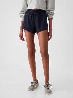 GapFit Mid Rise Dolphin Running Shorts | Gap Gap Shorts With Elastic Waistband, Summer Jogging Bottoms With Short Legs, Athleisure Shorts For Summer Jogging, Athleisure Jogging Shorts For Summer, Jogging Shorts With Elastic Waistband, Sporty Gap Shorts With Elastic Waistband, Casual Gap Bottoms With Moisture-wicking, Sporty Shorts With Elastic Waistband By Gap, Casual Moisture-wicking Bottoms By Gap