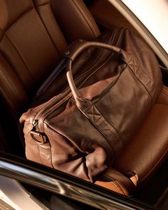 When it's expertly crafted, you can tell. The proof is in every stitch of our Nappa Leather Duffle Bag—made with long-lasting, full-grain leather and protective metal feet and room for all your on-the-go needs. Always fairly priced at $199.90. Modern Leather Travel Accessories For Everyday Use, Shoulder Support, Leather Duffle Bag, Leather Duffle, Duffle Bag Travel, Nappa Leather, Leather Working, Full Grain Leather, Travel Essentials