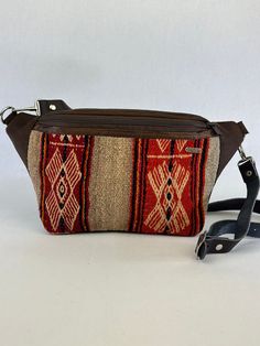 ❤Extended your style with a unique belt bag festival  ★Description Bohemian Pouch |Festival Purse | Bum Bag, Minimal Fanny Pack, Travel Bag, hip pack, Waist Pouch, Tasche  ★Fibers: Suede leather + 100% natural sheep wool, naturally dyed by hand from plants grown or foraged locally ★Dimensions: 13x7 inch Why you'll love this? Bohemian style & eclectic  ★Brings to your home a unique style and personality ★Harmonize and embellish yourself ★Be unique with style and awareness ★100% knitted accessorie Brown Shoulder Bag With Belt For Travel, Brown Belted Shoulder Bag For Travel, Adjustable Brown Shoulder Bag For Festival, Brown Belted Crossbody Bag, Handmade Rectangular Belt Bag For Travel, Bohemian Rectangular Belt Bag For Everyday Use, Bohemian Belt Bag With Belt Loops For Everyday Use, Bohemian Belt Bag For Everyday Use, Adjustable Crossbody Festival Bags