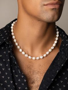 Cultured Baroque White Freshwater Pearls We use cultured pearls from oysters and freshwater mussels that we select by hand for all our jewelry Gold Filled Beads Approximate pearl size: 10 x 12 mm each Necklace has a 1.5 Inches Extension Chain Model is wearing 20 Inch Necklace Maluma and Shawn Mendes are wearing custom 19 Inch Necklace Product Code: MNEC_116 Designer's NotesStrung by hand in our LA studio from beautiful baroque freshwater pearls, this necklace will add a unique touch to all your Mens Beaded Necklaces, 20 Inch Necklace, White Freshwater Pearl, Unique Pendant, Pearl Choker, Hamsa Hand, Freshwater Pearl Necklaces, Pearl Size, Shawn Mendes