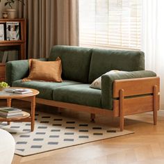 a living room scene with focus on the couch and coffee table in the foreground