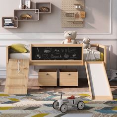 a child's bedroom with a chalkboard desk and toy car