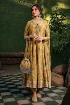 Yellow base anarkali with all over floral bloom prints and pleated flare. Paired with coordinating pant and dupatta with lace border. - Aza Fashions Anarkali Style Semi-stitched Floral Sharara, Semi-stitched Anarkali Set With Floral Print, Traditional Salwar Kameez With Floral Print For Transitional Season, Anarkali Traditional Wear With Floral Print, Bollywood Anarkali Set With Floral Print, Designer Semi-stitched Floral Anarkali Set, Transitional Floral Print Anarkali Set, Yellow Floral Print Kurta For Wedding, Floral Print Traditional Drape For Eid