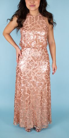 td {border: 1px solid #ccc;}br {mso-data-placement:same-cell;} Beautiful sequined gown featuring a halter neck. Perfect for a maid of honor or some sparkle in your bridal party. Brand: Donna Morgan Retail Price: $290 Color: Rose Gold Interior: Nylon; Exterior: Polyester Fully Lined Model Info: Height: 5'2 Waist: 26'' Wearing a size 2 *Style Notes: This dress runs small. Glamorous Sleeveless Sequin Wedding Fabric, Glamorous Sleeveless Sequin Wedding Dress, Sequin Fabric For Wedding Prom Season, Glamorous Sequin Fabric For Wedding And Prom Season, Sequin Bridesmaid Gown Floor-length, Sequin Floor-length Bridesmaid Gown, Sequined Floor-length Bridesmaid Gown, Floor-length Sequined Bridesmaid Gown, Fitted Halter Neck Sequin Wedding Dress