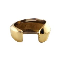 Pomellato 18 Karat Yellow Gold Wide Cuff Bracelet  This gorgeous cuff bracelet by designer Pomellato was crafted from 18K yellow gold and will look beautiful on you!  Size: 7" inside circumference Width: 1.6"  Weight: 51.3 dwt/ 79.8 g  Hallmark: 750 419 AL  Very good condition, professionally polished.  Will come packaged in a gift box or pouch (when possible) and will be shipped U.S. Priority Mail Insured. Luxury Open Band Bangle For Gift, Luxury Open Band Bracelet For Formal Occasions, Luxury Open Band Bangle As Gift, Luxury Open Band Bracelets For Formal Occasions, Luxury Polished Cuff Bracelet, Luxury Wide Band Gold Bangle, Formal Yellow Gold Cuff Bracelet, Adjustable Open Band Bangle For Formal Occasions, Yellow Gold Polished Cuff Bracelet For Anniversary