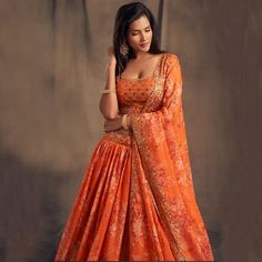 Create an impression by wearing this Organza silk Lehenga. 😍 The elaborate embroidery, threadwork, sequence work and printed floral patterns are crafted beautifully to make you stand out. 🤌 Product code: 1756297 📣 Shop now #Blackfridaysale 🔥 Get up to 55% OFF+ extra 15% OFF 🔥 Apply code- BF22 #indianwedding #indianweddingsaree #ethnicwear #ethnicwearonline #festivecollection #worldwideshipping #ethnicdress #traditionalwear #madeinindia #onlineshopping #festivecollection #lehenga Orange Georgette Sharara For Wedding, Art Silk Gown With Floral Embroidery For Wedding, Wedding Gown With Floral Embroidery In Art Silk, Floral Embroidered Sharara With Traditional Drape For Wedding, Traditional Art Silk Gown With Floral Embroidery, Orange Lehenga With Unstitched Blouse For Reception, Floral Embroidered Sharara For Wedding Navratri, Floral Embroidered Sharara For Wedding And Navratri, Floral Embroidery Sharara With Traditional Drape For Wedding