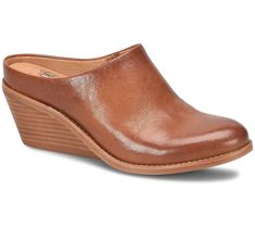 Elevate your everyday style with the Nicki, a sculpted leather wedge clog that effortlessly transitions from casual denim days to dressier evenings. Its sleek silhouette and easy slip-on design make it a versatile staple for any wardrobe. From Sofft. Denim Day, Leather Wedges, Casual Denim, Wedge Heels, Clogs, Sleek, Everyday Fashion, Leather Upper, Wedges