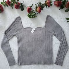 Gorgeous, Silver Metallic Banana Republic Sweater/Top. Nwt And Size Xl It Has A Lovely Shimmer With A Sweetheart Neckline. It Is A Fitted Top Of Hip Length. Material Is 81% Viscose Rayon, 12% Metallic & 7% Nylon. Please See Measurements That Were Taken With Garment Laying Flat. Also Included Is The Br Sizing Chart. #Christmas #Holiday #New Years #Date Night Chic Silver Tops For Winter, Trendy Metallic Tops For Fall, Metallic Fitted Tops For Winter, Metallic Long Sleeve Tops For Fall, Silver Long Sleeve Tops For Fall, Fitted Silver Tops For Spring, Silver Tops For Winter Party, Gray Party Tops For Fall, Silver Party Tops For Winter