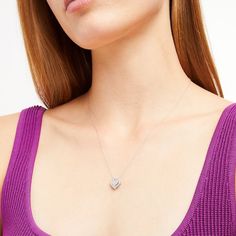 Win her heart with this petite and oh-so-sweet diamond pendant. Created in sterling silver, this darling design showcases a heart-shaped composite of diamonds sparkling in a diamond-lined frame. Radiant with 1/8 ct. t.w. of diamonds and a brilliant buffed luster, this pendant suspends along an 18.0-inch rope chain that secures with a spring-ring clasp. Heart Frame, Diamond Heart, Rope Chain, Showcase Design, Spring Rings, Diamond Pendant, Composition, Diamonds, Sparkle