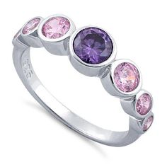 Top of ring height: 6.2mm

Band width: 2.6mm

Shank width: 2.2mm



Stone material: pink & purple cubic zirconia

Center stone size: 5mm

Stone shape: round

Center stone carat weight: 0.46 ct.

Total number of CZ stones: 7

Stone setting: bezel setting



Metal: 925 sterling silver

Plating: rhodium plated

Finish: high polish Stone Material, Stone Setting, Cz Ring, Alex And Ani, Cz Stone, Stone Settings, Bezel Setting, Quality Jewelry, Rhodium Plated