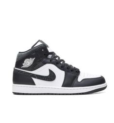 This iteration of the Air Jordan 1 Mid sneakers arrives in a timeless black and white colourway. Crafted from leather, the iconic pair boast two famous logos - the Swoosh and Air Jordan Wings. Designed with padded inner uppers and an encapsulated air unit in each heel, they offer maximum comfort. Jordan Wings, Mid Sneakers, Famous Logos, Jordan Air, Wings Logo, Air Jordan 1 Mid, Jordan 1 Mid, Air Jordan 1, Sneakers Black