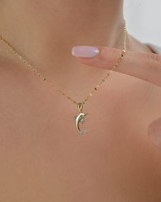 Material: Gold Carat: 14K (585) Solid Gold   14k Gold Dolphin Pendant, Dolphin Chain Necklace, Sequin Chain Necklace, Small Dolphin Charm Pendant, Necklace Gifts for Her, Birthday Gifts for Her  Ring Details 14K Solid Gold Plated is not gold it is real solid gold Gold Color Options; Yellow Gold, White gold, Rose Gold, - All products are made to order in Turkey. - This product is sleek and stylish. It is produced carefully to make you and your loved ones happy. Prepared with love and experience. Fine Jewelry Pendant Necklace For Birthday, Gold Tarnish Resistant Necklace For Birthday, Gold Plated White Gold Chain Necklace For Anniversary, White Gold Plated Chain Necklace For Anniversary, Elegant Tarnish Resistant Necklace For Birthday, Elegant Yellow Gold Necklace For Birthdays, Gold Plated Chain Necklace Stamped 14k For Gift, Elegant Gold Plated Necklaces For Birthday, Yellow Gold Pendant Chain Necklace As Gift