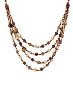 PRICES MAY VARY. Vintage Style: Embrace retro charm with this beaded wooden necklace, featuring a multi-layered design for a chic, bohemian aesthetic. Versatile Accessory: Effortlessly elevate any outfit, from casual to formal, with this statement necklace that adds a touch of vintage flair. Bonus Earrings: Complete your look with the included pair of matching earrings, creating a cohesive and stylish ensemble. Thoughtful Gift: Make a lasting impression with this necklace and earrings set, an id Fall Bead Necklaces, Bohemian Brown Necklace With Oval Beads, Bohemian Brown Necklace With Unique Variations, Bohemian Brown Long Necklace, Bohemian Multi-strand Brown Beaded Necklaces, Monochrome Style, Holiday Accessories, Vintage Brown Multi-strand Beaded Necklace, Fall Bead