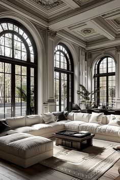 a large living room with lots of windows