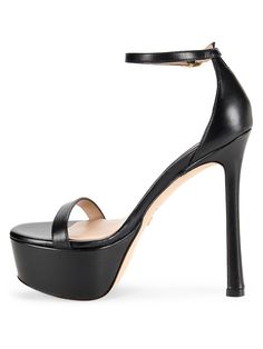 Step Into The World Of Comfort And Style With These Platform Sandals Crafted From Superior Leather. Leather Upper Open Toe Ankle Buckle Lining: Leather Padded Insole Leather & Synthetic Sole Made In Spain Size Self-Covered Stiletto Heel, 5.5" (140mm) Platform Height, 1.5" (38mm). Center Core - W Designer Shoes > Saks Off 5th. Stuart Weitzman. Color: Black. Size: 10. Leather Single Strap Sandals For Party, Leather Single Strap Sandals For Evening, Single Strap Leather Sandals For Party, Leather High Heel Sandals With Single Strap, Leather Heels With Single Strap For Evening, Leather Single Strap Heels For Evening, Sleek Leather Heels With Strap, Sleek Leather Strap Heels, Leather Single Strap Party Heels