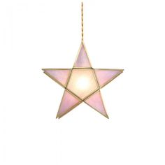 a pink star hanging from a gold chain