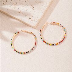 New Multi Color Adorable Hoop Statement Earrings On Gold Perfect Earrings For Any Outfit Summer Hoop Earrings With Colorful Beads, Colorful Beads Hoop Earrings, Colorful Beads Hoop Earrings For Beach, Multicolor Beaded Hoop Earrings For Beach, Colorful Hoop Earrings For The Beach, Colorful Beaded Hoop Earrings For Beach, Multicolor Beaded Hoop Earrings For Summer, Multicolor Hoop Earrings For Summer, Colorful Small Hoop Earrings For Summer