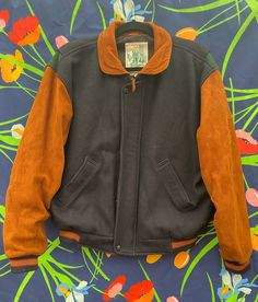 Vintage Barbara Streisand 1994 varsity jacket w/ two tone color way / stripes on cuffs. Verrryyyy rare, found other golden bear varsity jackets but none like this and none w/ barbara Streisand embroidery so it might've been a crew only jacket Size: M Brand: Golden Bear Condition: like new We can do a deal through PayPal or Venmo to save money on etsy fees Classic Fall Outerwear With Contrast Stripes, Retro Brown Varsity Jacket With Long Sleeves, Retro Brown Varsity Jacket, Classic Brown Long Sleeve Varsity Jacket, Retro Outerwear With Baseball Collar And Ribbed Cuffs, Fall Varsity Sport Coat With Ribbed Cuffs, Varsity Sport Coat With Ribbed Cuffs For Fall, Retro Brown Varsity Jacket For Streetwear, Casual Brown Varsity Jacket With Baseball Collar