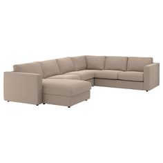 a beige sectional couch with two recliners on the back and one end facing it