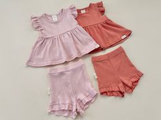 **We have added additional sizes to this Mix & Match Collection, we now go up to size 7 This pointelle playset is breathable and cozy with a girly touches! We have designed these with a ruffle cap sleeve, peplum top and ruffled bottoms.  These sets are gentle against your Lovie's skin and make for a great playset! Pair this playset with any of our other pieces in our new Mix & Match Collection, add a pair of our best selling scrunch socks, or grab a sweater to pair with the playset for chilly, s Playful Solid Color Cotton Sets, Cute Sleeveless Solid Color Sets, Cute Solid Color Summer Sets, Cute Solid Color Sleeveless Sets, Cute Fitted Solid Color Sets, Fitted Sets For Playwear, Cute Fitted Sets, Pink Playtime Sets With Ruffles, Stretch Sets For Summer Playtime