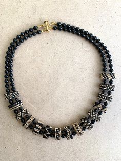 I've mixed Black and Gold Japanese seadbeads to create a versatile and fun necklace that can be used during the day or at night. Black Gold Necklace, Cool Necklaces, Bead Necklace, Beaded Necklaces, Black And Gold, Necklace Etsy, Gold Necklace, Beaded Necklace, Etsy Accessories