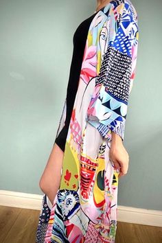 Beautiful handmade vintage / Boho style kimono robe, ideal for fashion at home or wear over jeans & tee. Beach cover up, multi coloured Art print design.Lovely, floaty, soft silky fabric, ideal for covering up on the beach or throw over pyjamas. Pretty multi colour design, features flowers, ladies faces, and modern art styling. Free size fits from UK size 8 to size 16machine washable Multicolor Summer Kimono For Beach Cover-up, Beach Season Patterned Printed Maxi Dress, Patterned Long Maxi Dress For Vacation, Patterned Long Maxi Dress For The Beach, Patterned Maxi Dress For The Beach, White Abstract Print Maxi Dress For Summer, Colorful Beachwear Maxi Dress For Vacation, Colorful Maxi Dress For Beach Vacation, Colorful Beach Season Maxi Dress For Vacation