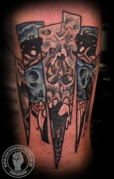 a man with a tattoo on his arm that has three skulls and two knives in it