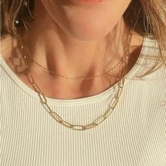 The Ultimate Layering Piece, You Need To Stack Your Jewelry Wardrobe With! This 18k Gold Paperclip Chain Is The Perfect Layering Necklace At 17" With 2" Extender, It Can Be Worn As A Choker Or Longer Up To 19" 18k Pvd On Stainless Steel Chain Width : 4.5mm Water, Sweat, Heat Resistant (No Discoloring Or Tarnishing) Bundle And Save! Tags Tags Everyday Jewelry Layered Snake Chain Necklace Simple Gold Beaded Paperclip Box Chain Choker Necklaces Trendy Gold Necklace For Women Girls Gift For Sister G Minimalist Gold Paperclip Necklace, Trendy Gold Layered Necklace With Paperclip Chain, Gold Link Charm Necklace For Everyday, Trendy Gold Charm Necklaces With Cable Chain, Everyday Double Chain Necklaces With Rectangular Links, Double Chain Paperclip Necklace For Gift, Gold-tone Paperclip Chain Necklace, Gold Paperclip Double Chain Jewelry, Paperclip Double Chain Necklace For Gift