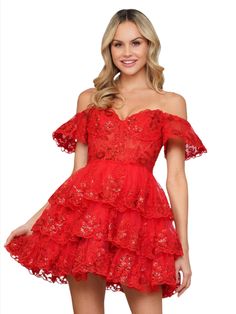 This homecoming dress Colors 3347 features a beautiful 17-inch lace ruffle skirt and a sheer corset bodice, along with intricate lace ruffle sleeves. Combining elegance and playfulness, this dress is perfect for standing out at any formal event. Ruffle layered tulle and lace hem skirt adorned with sequins. Corset style bodice! Sizes: 0-14 Colors: Black, Hot Pink, Off White, Red Strapless Ruffle Homecoming Dress, Strapless Ruffle Dress For Homecoming, Scalloped Lace Dress With Sweetheart Neckline For Prom, Fitted Lace Dress With Ruffled Skirt, Ruffled Corset Dress For Gala And Prom Season, Tiered Lace Dress With Ruffles, Lace Corset Dress With Ruffles, Lace Party Dress With Ruffled Straps, Prom Season Dress With Scalloped Lace And Fitted Bodice