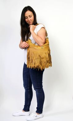 LEATHER FRINGE - leather boho fringe handbag. This hobo is the perfect size to carry your daily essentials in style! It is made from high quality leather. This leather bag can be used as a tote and messenger bag. By using the adjustable leather strap you can convert it into a crossbody bag. This leather bag is a perfect everyday bag! There is a lot of space and you can put there everything in your everyday life. * Lining * An external pocket on the back * Includes internal pockets for mobile pho Fall Fringe Hobo Shoulder Bag, Everyday Fringe Rectangular Hobo Bag, Daily Use Hobo Bag With Fringe, Leather Hobo Bag With Fringe, Leather Hobo Shoulder Bag With Fringe, Leather Fringe Hobo Shoulder Bag, Travel Fringe Hobo Shoulder Bag, Travel Hobo Shoulder Bag With Fringe, Fringe Hobo Bag For Daily Use In Fall