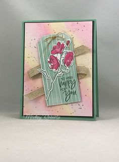 a card with some pink flowers on it