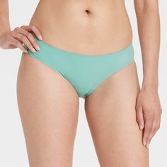 Get a great no-show option for any outfit with this Bonded Microfiber Bikini Underwear from Auden™. This mid-rise bikini underwear features a cotton gusset, bonded edge and lingerie hem, and comes in assorted colors and prints. The bonded microfiber fabric feels soft against your skin, and the added spandex offers you a comfy fit that moves with you as you take on your day. Auden™: Comfort true to every shape & hue. Solid Stretch Tankini Brief, Solid Color Stretch Tankini Brief, Solid Color Stretch Tankini With Briefs, Stretch Swimwear Bra Friendly, Stretch Swimwear With Bra-friendly Design, Seamless Nylon Brief Swimwear, Stretch, Bra-friendly Swimwear, Fitted Seamless Brief Swimwear, Seamless Fitted Swimwear Briefs