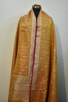 > What is the Quality ? Vintage 100% Pure silk Zari Copper Thread Heavy Brocade Banarasi Yellow Saree. > What is Special About these Product ? Now Presently these Saree are not in Processing in India. Only Efficient Weaver with Special Silk can Wear these Heavy Vintage Brocade, Tanchoi Jamaver Saree. Depending on the intricacy of its designs and patterns, a sari can take from 15 days to a month and sometimes up to six months to complete. > Dimension and Weight Length : 5.46 Yard. Width Transitional Gold Tussar Silk Kurta, Gold Silk Kurta With Cutdana, Gold Tussar Silk Dupatta With Zari Work, Gold Salwar Kameez With Pallu, Gold Tussar Silk Dupatta For Navratri, Katan Silk Dupatta With Zari Weaving For Celebration, Traditional Drape Gold Salwar Kameez, Celebration Katan Silk Dupatta With Zari Weaving, Gold Salwar Kameez With Traditional Drape