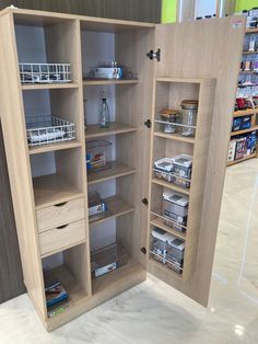 the shelves in the store are open to show various items and storage bins on them