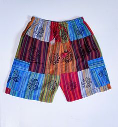 Cute boho hippie patchwork shorts unisex Multicolored and multipatched Pockets on both side Brand new 100% cotton handmade Drawstring with elastic waistband *patch shorts one size only Fits small,medium,large and XL *S, M,L and xl available in other shorts Fast and free delivery 1-3 days We ship same day #boho #shorts #hippie #patch #patchwork Cheap Multicolor Cotton Shorts, Cheap Blue Patchwork Shorts, Multicolor Hippie Shorts For Vacation, Casual Cotton Patchwork Shorts, Hippie Multicolor Beach Shorts, Hippie Multicolor Shorts For Beach, Hippie Multicolor Shorts For The Beach, Casual Multicolor Festival Shorts, Blue Cotton Patchwork Shorts