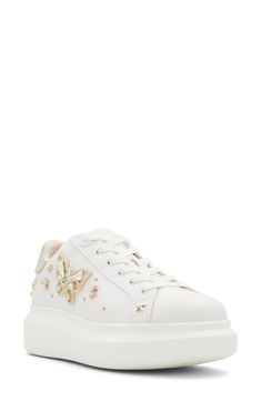 Sparkling studs and butterflies make a delightful statement on a platform sneaker that's sure to stand out from the crowd. Lace-up style Synthetic upper/leather and synthetic lining/synthetic sole Imported Embellished Leather Lace-up Sneakers, Embellished Low-top Sneakers For Spring, Embellished Low-top Synthetic Sneakers, Embellished Synthetic Low-top Sneakers, Embellished Lace-up Sneakers For Spring, Spring Embellished Lace-up Sneakers, Spring White Platform Sneakers With Studded Outsoles, White Platform Sneakers With Studded Outsoles For Spring, Casual Embellished Sneakers For Spring