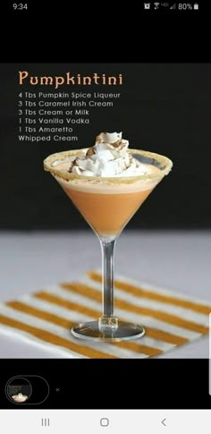 pumpkin spice liqueur in a martini glass with whipped cream and caramel garnish